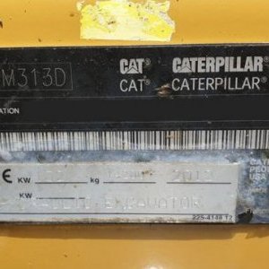 foto 14t bagr široká kola CAT rypadlo kolové