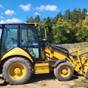 foto traktorbagr CAT 428E (SPZ) rypadlo-nakladač